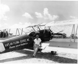 WWII Bomber Pilot and Crop Duster O.A. "Bruce" Broussard gave Robert Riggs his first flying lessons in high school. Broussard is pictured with his Stearman BiPlane that played an important role training pilots during World War II.