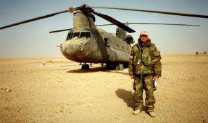Embedded Reporter Robert Riggs waits out a sandstorm in Iraq with a crew from the 101st Airborne flying a CH-47 Chinook helicopter dubbed the "Apocalypse Cow"